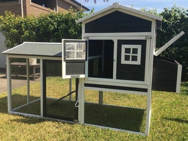 black and white Mansion Guinea Pig hutch